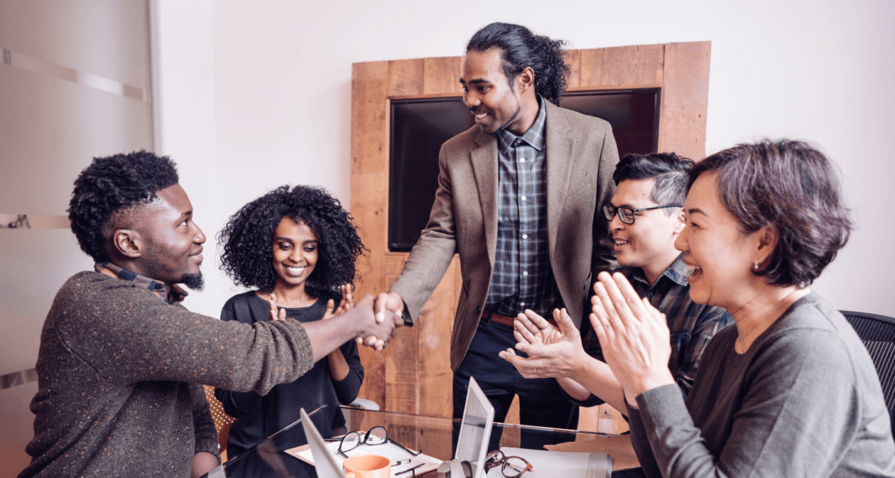 Marketing experts discussing Google Ads Keywords and strategy